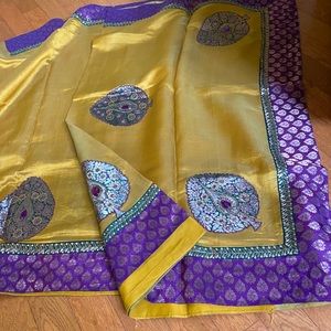 Shiny yellow saree with purple border